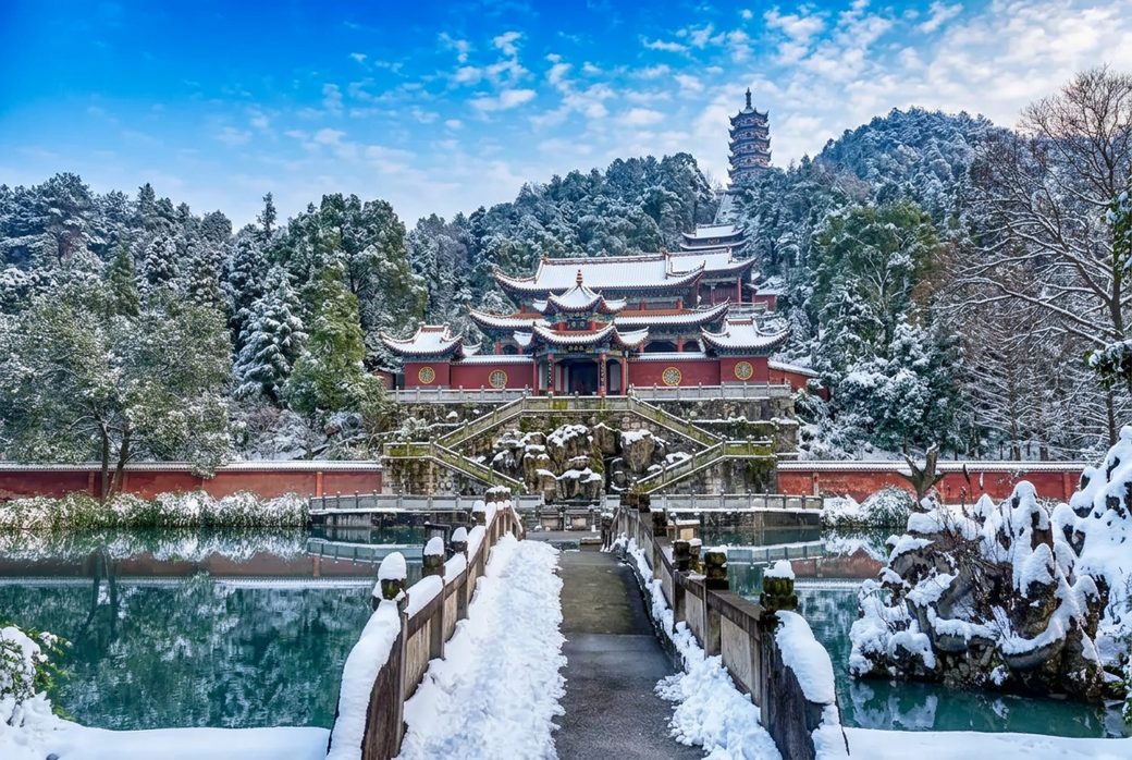 Jiashan Temple hillside Chan Buddhist temple among forest trees with stone steps Shimen Hunan
