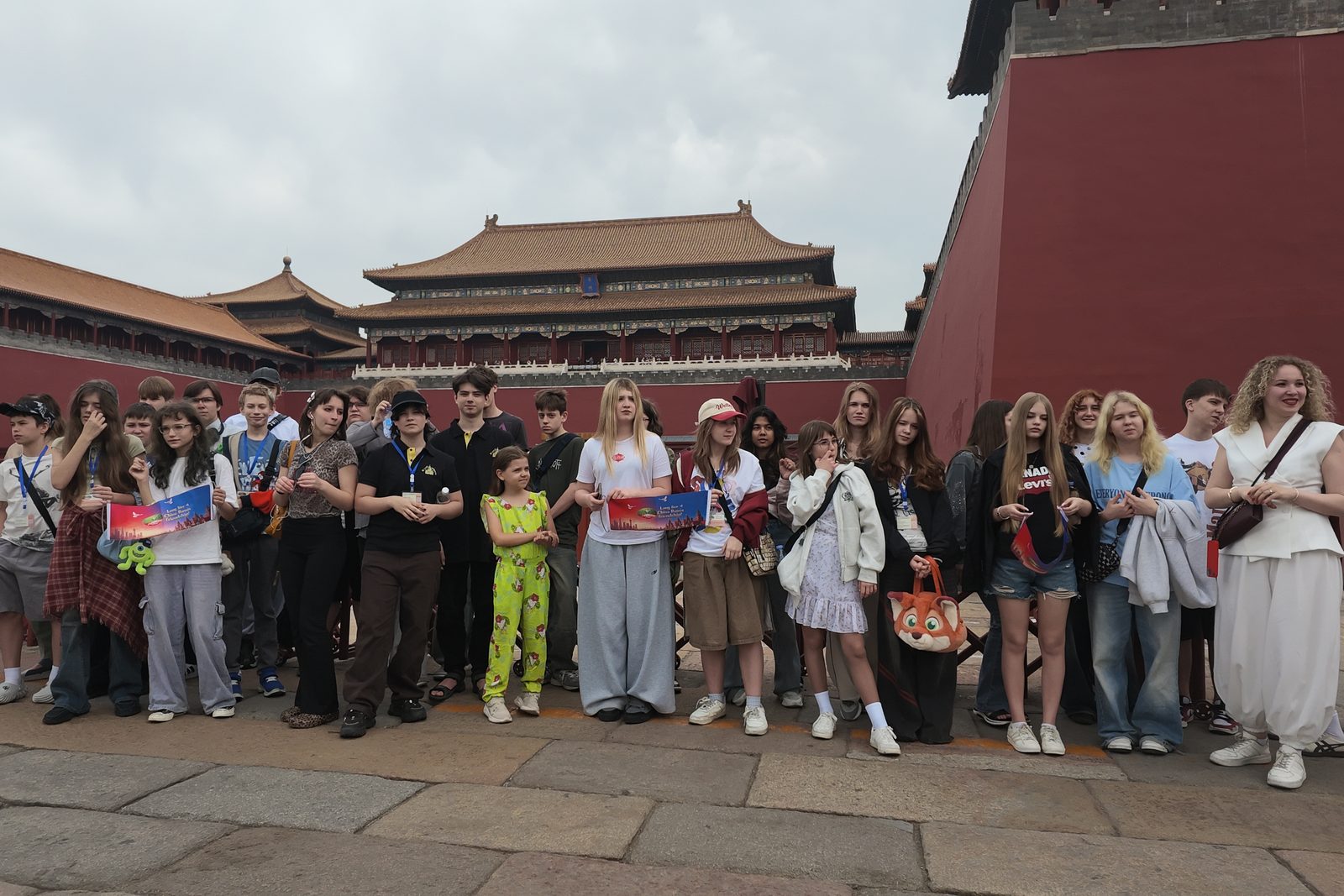 The student group in front of a gate of the Forbidden City in Beijing