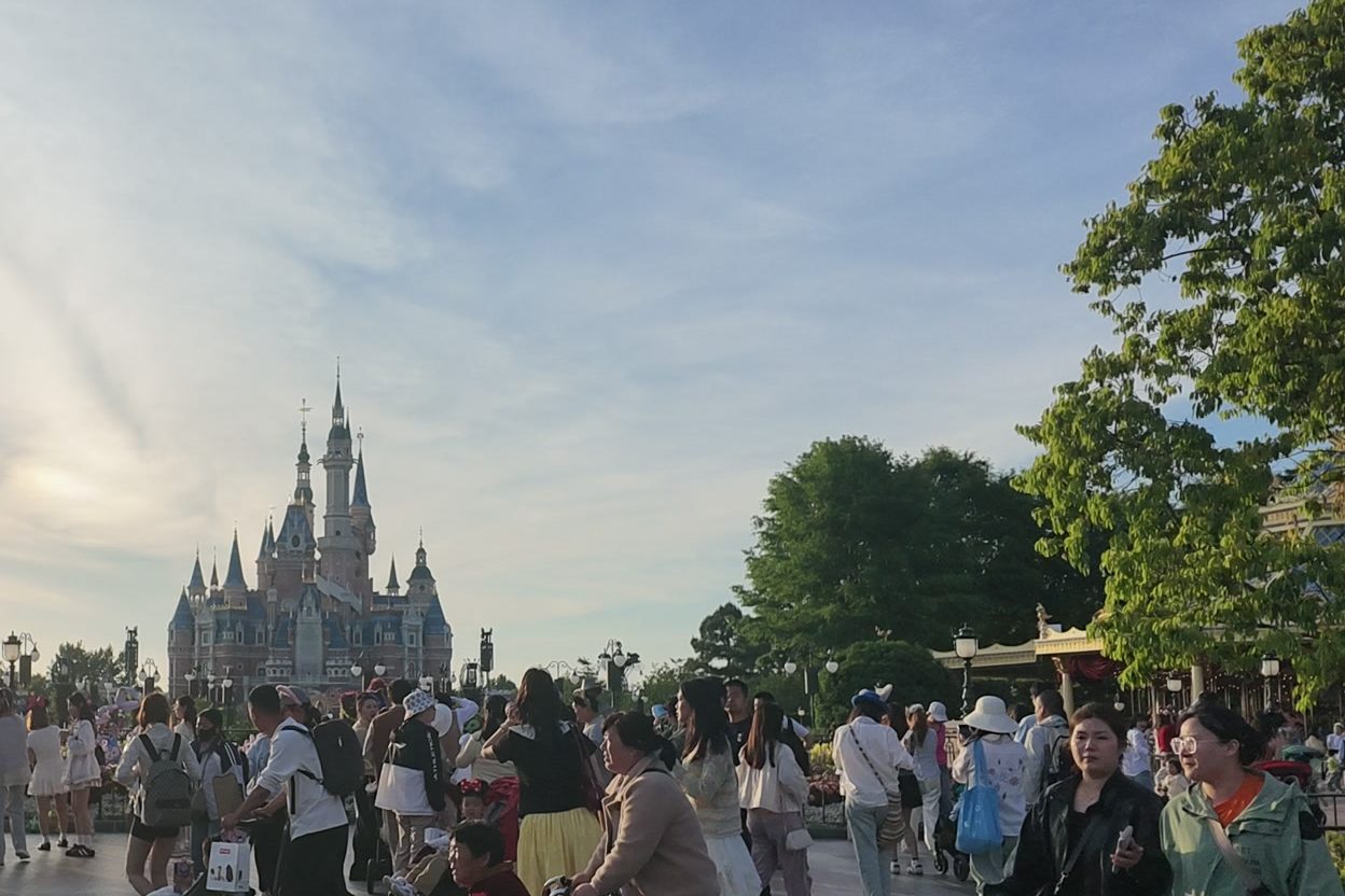 The Enchanted Storybook Castle at Shanghai Disney Resort in the evening light